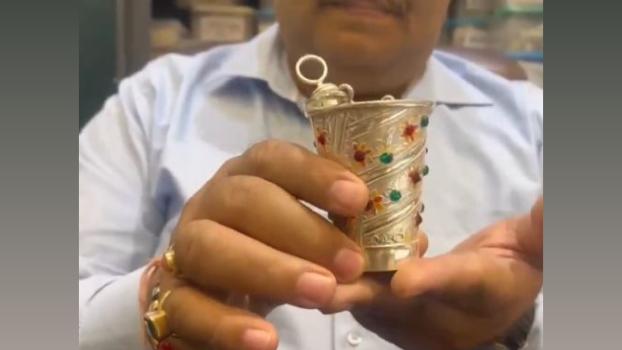 The silver pichkari