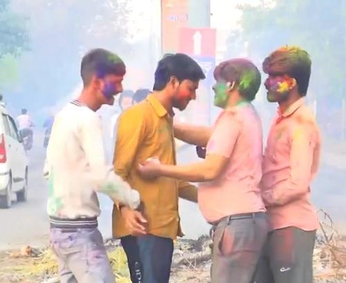 People celebrate Holi in Aligarh, Uttar Pradesh on Friday/ANI on X