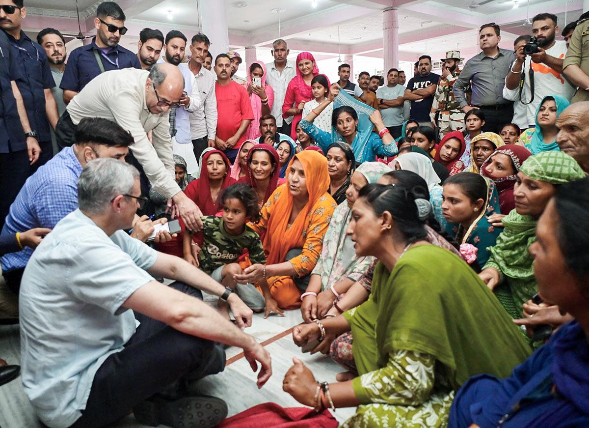 Jammu and Kashmir CM Omar Abdullah interacts with the families who were displaced by Pak shelling in Jammu/ANI Photo