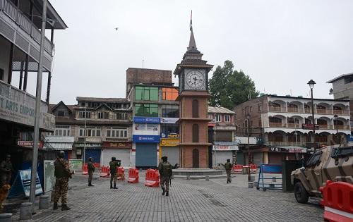 Security personnel at Srinagar's Ghar Lal Chowk after loud explosions on Saturday/Umar Ganie/Rediff