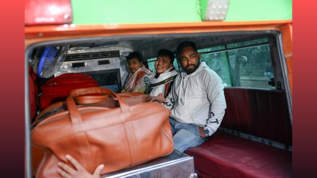 Relatives of a blast victim wait at a mortuary. Anushree Fadnavis/Reuters