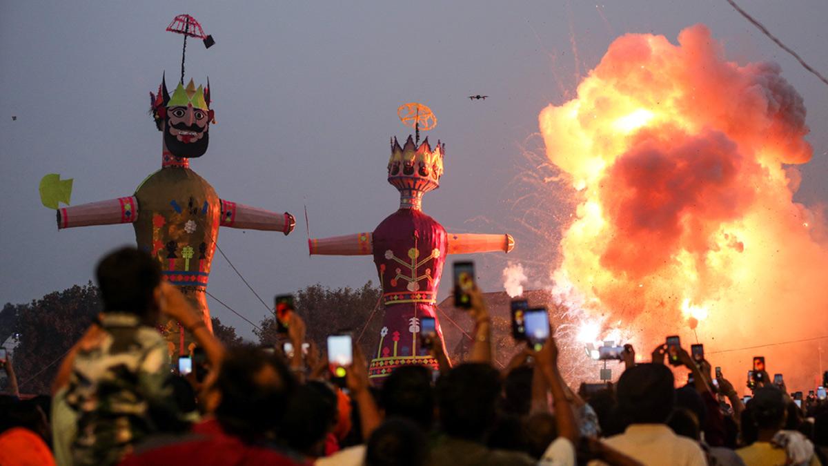 Effigies of Ravana, Kumbhkaran, and Meghnath set ablaze during Ravan Dahan Effigies of Ravana, Kumbhkaran, and Meghnath set ablaze during Ravan Dahan