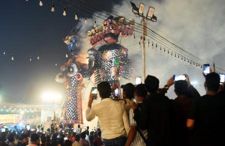 Effigies of Ravana, Kumbhkaran, and Meghnath set ablaze during Ravan Dahan at the Luv Kush Ramlila at Red Fort ground Effigies of Ravana, Kumbhkaran, and Meghnath set ablaze during Ravan Dahan at the Luv Kush Ramlila at Red Fort ground
