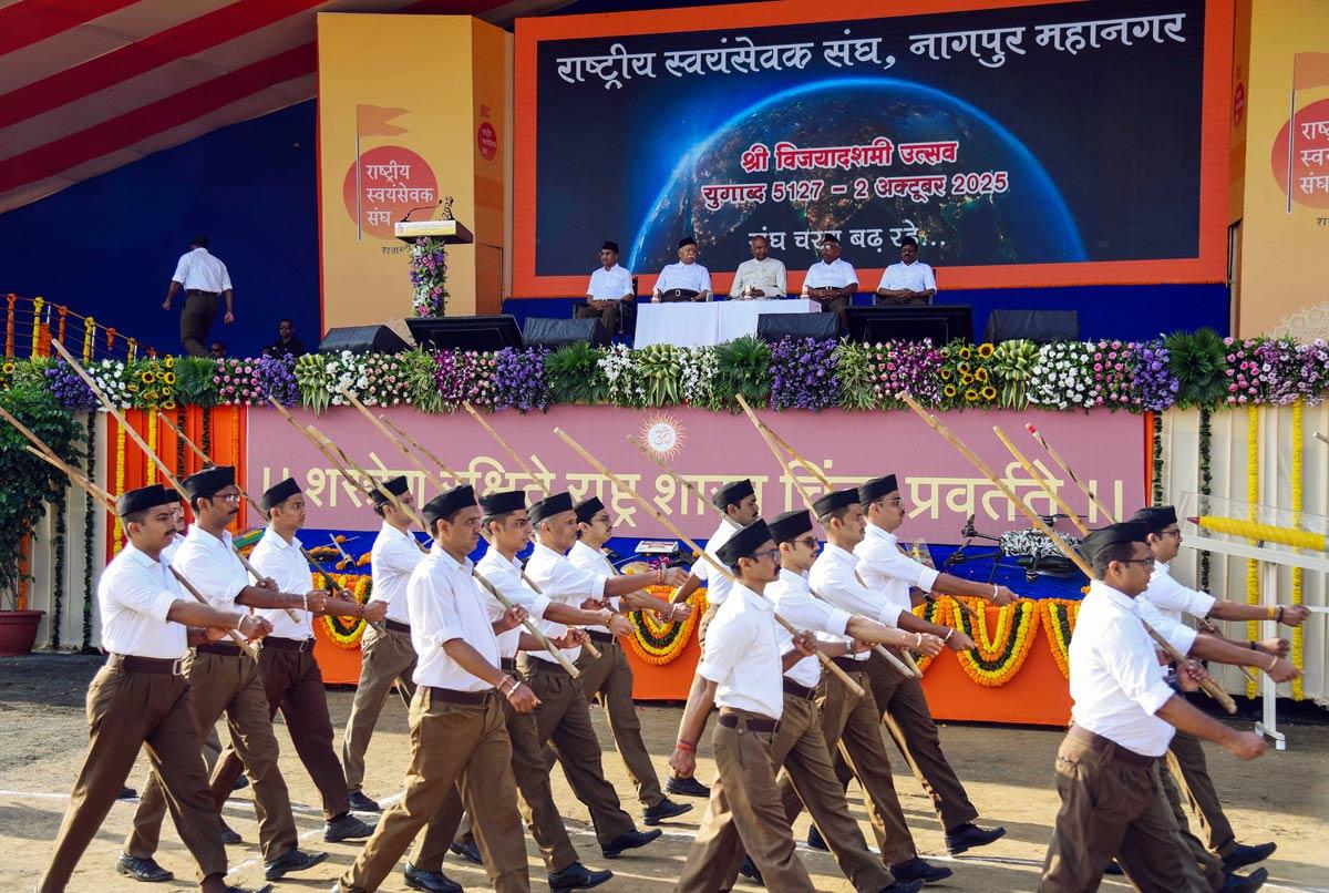 RSS members participate in the route march in the presence of Former President Ram Nath Kovind and RSS Chief Mohan Bhagwat on the occasion of Vijayadashami celebration