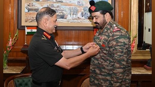 Malayalam superstar Mohanlal is given a commendation by Army Chief Gen Upendra Dwivedi in New Delhi./Courtesy Mohanlal on X