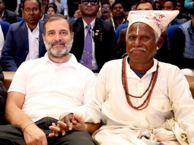 Rahul Gandhi with Dashrath Manjhi's son Bhagirath Manjhi at the 'Samvidhan Suraksha Sammelan', at Bapu Sabhaghar in Patna