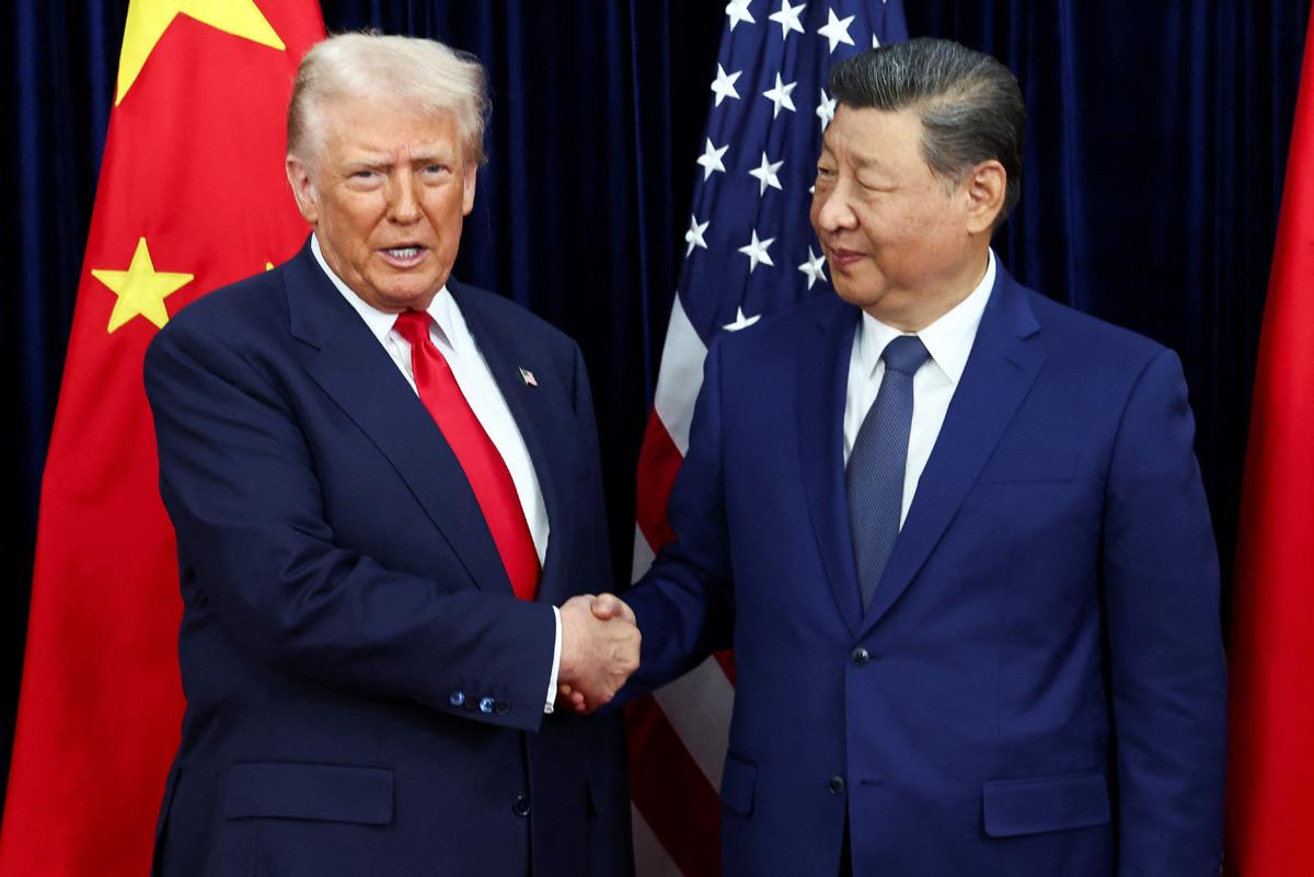 U.S. President Donald Trump shakes hands with Chinese President Xi Jinping as they hold a bilateral meeting at Gimhae International Airport, on the sidelines of the Asia-Pacific Economic Cooperation (APEC) summit, in Busan, South Korea, October 30, 2025. U.S. President Donald Trump shakes hands with Chinese President Xi Jinping as they hold a bilateral meeting at Gimhae International Airport, on the sidelines of the Asia-Pacific Economic Cooperation (APEC) summit, in Busan, South Korea, October 30, 2025.