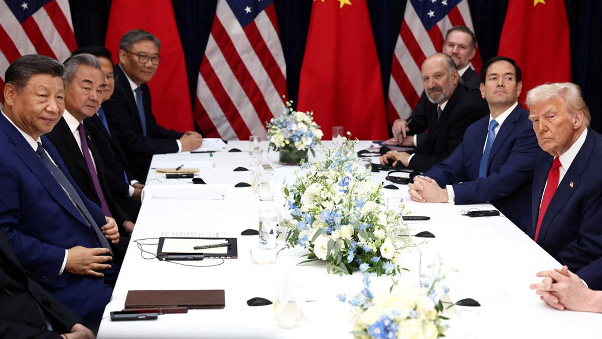 U.S. President Donald Trump, accompanied by U.S. Secretary of State Marco Rubio and U.S. Secretary of Commerce Howard Lutnick, attends a bilateral meeting with Chinese President Xi Jinping, accompanied by Chinese Foreign Minister Wang Yi, at Gimhae International Airport, on the sidelines of the Asia-Pacific Economic Cooperation (APEC) summit, in Busan, South Korea, October 30, 2025. U.S. President Donald Trump, accompanied by U.S. Secretary of State Marco Rubio and U.S. Secretary of Commerce Howard Lutnick, attends a bilateral meeting with Chinese President Xi Jinping, accompanied by Chinese Foreign Minister Wang Yi, at Gimhae International Airport, on the sidelines of the Asia-Pacific Economic Cooperation (APEC) summit, in Busan, South Korea, October 30, 2025.