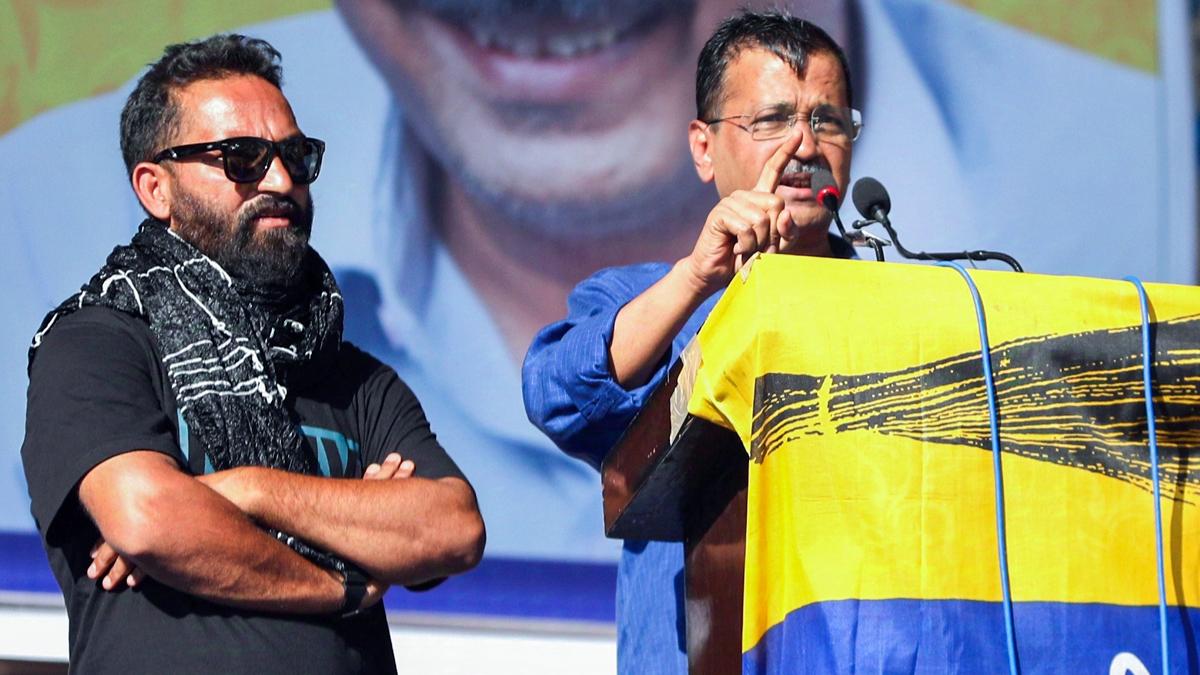 AAP MLA Mehraj Malik (left)