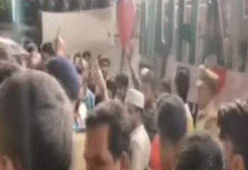 Protests before the 'I Love Muhammad' banner