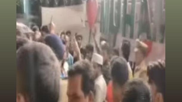 Protests before the 'I Love Muhammad' banner