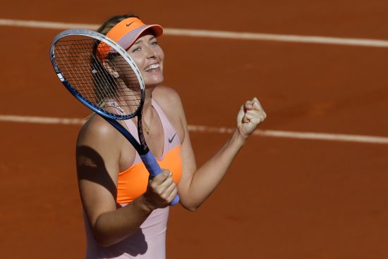 Maria Sharapova of Russia reacts after winning her women's semi-final match against Eugenie Bouchard of Canada