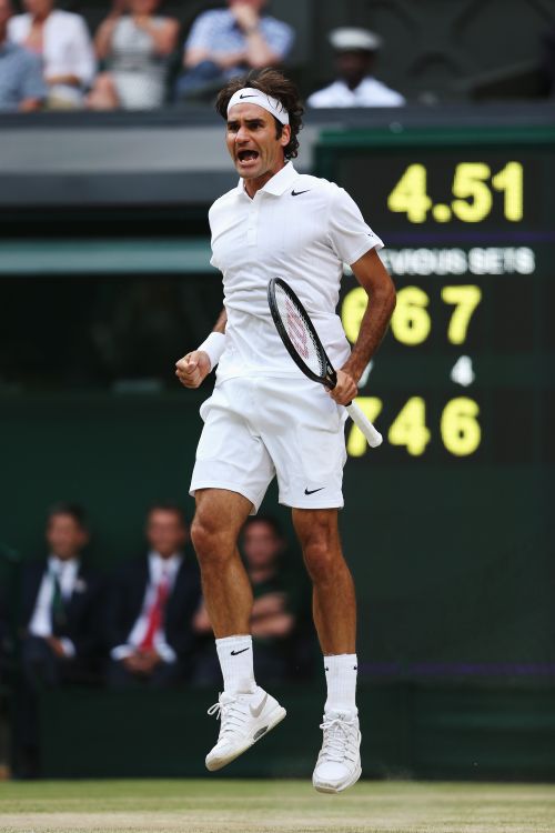 Roger Federer of Switzerland reacts after winning a point