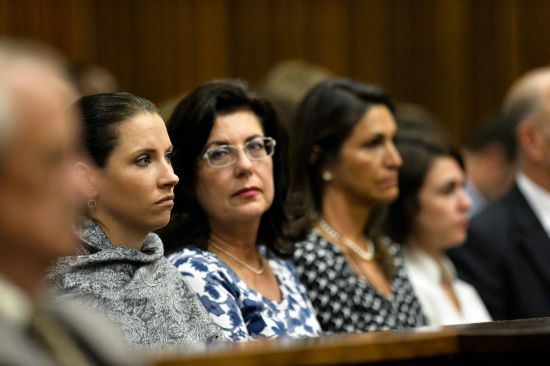 Family members of Olympic and Paralympic track star Oscar Pistorius attend the fifth day of his trial for the murder of his girlfriend Reeva Steenkamp at the North Gauteng High Court 