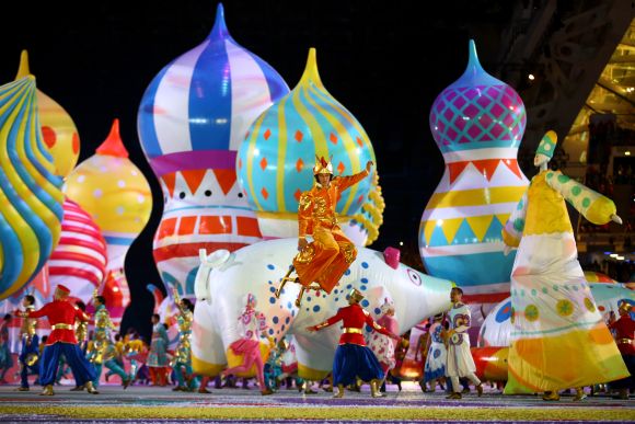 Dancers perform with inflated objects during the Opening Ceremony of the Sochi 2014 Winter Olympics