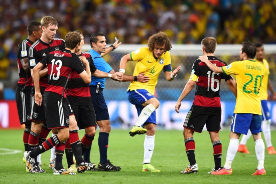 David Luiz of Brazil protests to referee Marco Rodriguez after a challenge
