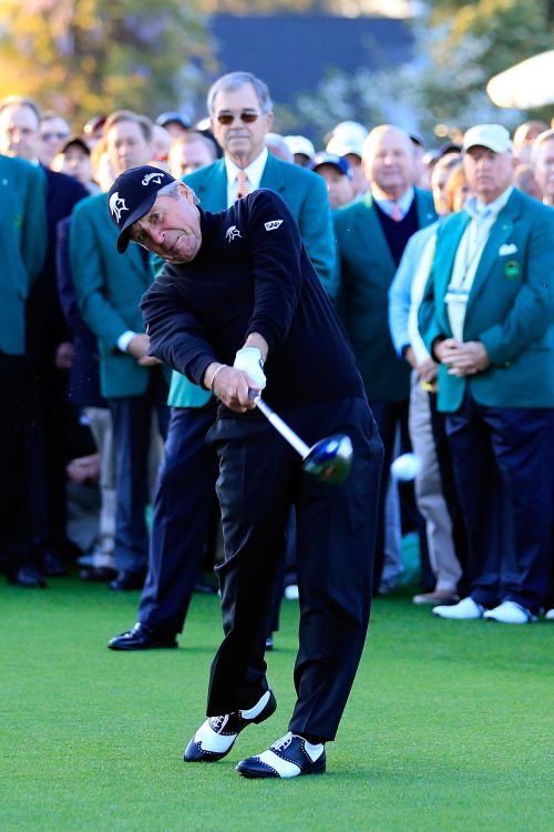 Honorary starter Gary Player of South Africa hits a tee shot on the first hole at the start of the first round of the 2014 Masters Tournament 