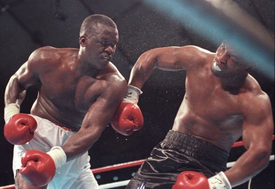 Challenger James Buster Douglas knocks out Mike Tyson in their heavyweight title fight