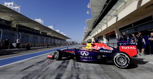 Sebastian Vettel of Germany and Infiniti Red Bull Racing exits his garage to drive 