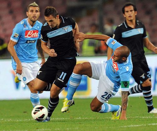 Miroslav Klose of Lazio and Paolo Cannavaro of Napoli in action during the Serie A match