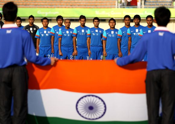  The India team sing their national anthem 
