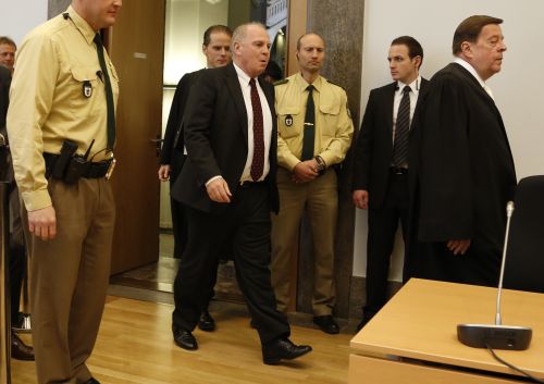 President of Bayern Muenchen Ulrich Hoeness (C) and his lawyer Hanns W. Feigen (R) arrive in the courtroom during Hoeness' trial for tax evasion