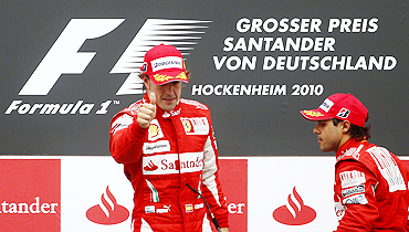Fernando Alonso (left) and Felipe Massa on the podium after the German GP on Sunday