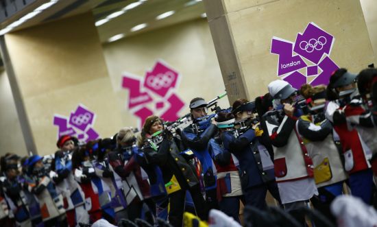 Competitors participate in the women's 10m air rifle qualification competition
