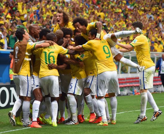 Brazilian players celebrate after scoring