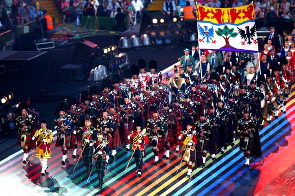 The Pipes and Drums of The Scottish Regiments perform during the Opening Ceremony for the Glasgow 2014 Commonwealth Games