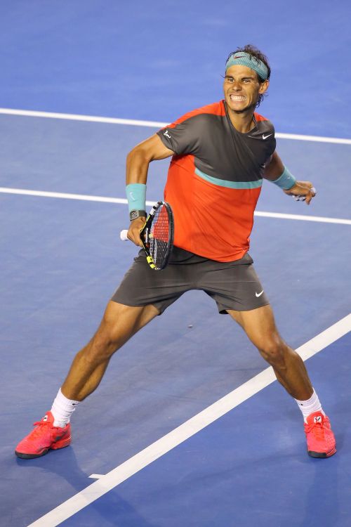 Rafa Nadal celebrates after winning the semi-final match against Roger Federer
