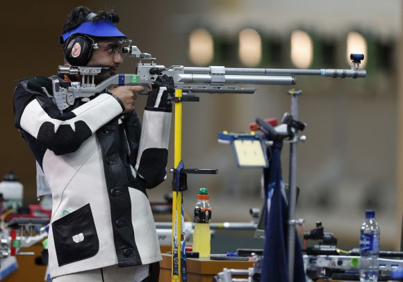 Abhinav Bindra competes in the 10m air rifle at Barry Buddon Shooting Centre during day two of the Glasgow 2014 Commonwealth Games