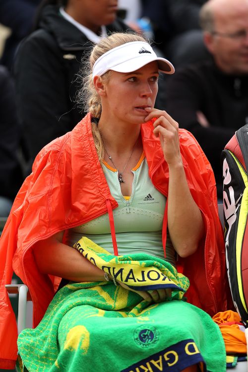 Caroline Wozniacki of Denmark reacts after losing