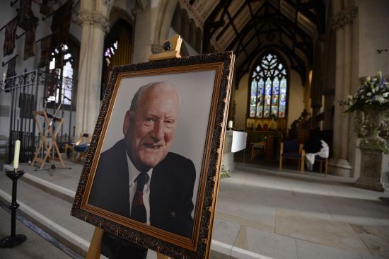 A portrait of former Preston and England soccer player Tom Finney is displayed in a church ahead of his funeral at Preston Minster,