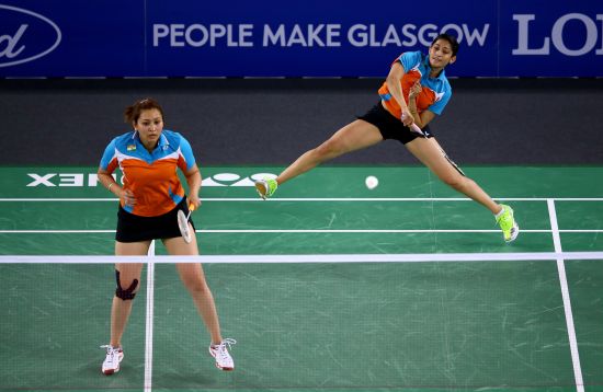 Ashwini Ponnappa and Jwala Gutta of India in action during their women's doubles match against Shinta Mulia Sari and Lei Yao of Singapore in the Mixed Team Bronze medal 