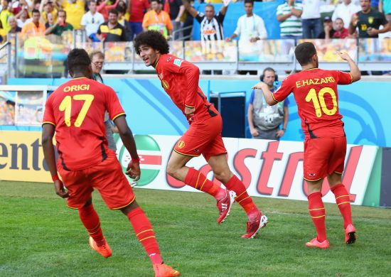 Marouane Fellaini of Belgium celebrates scoring his team's first goal 