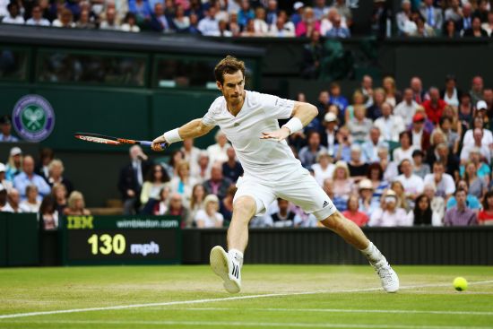 Andy Murray of Great Britain his a forehand return during his Gentlemen's Singles fourth round match against Kevin Anderson of South Africa 