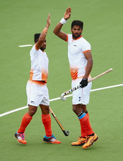 Rupinder Singh of India celebrtaes after scoring a goal during the men's preliminaries match between India and Australia A