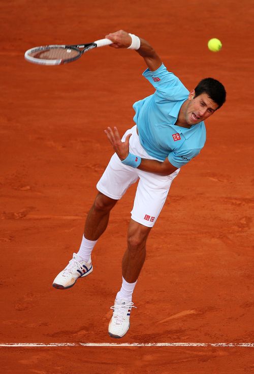 Novak Djokovic of Serbia serves during his men's singles match against Marin Cilic of Croatia.