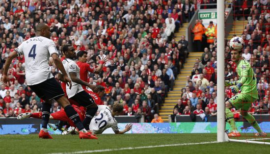 Tottenham Hotspur's Hugo Lloris (R) watches as Liverpool's Jordan Henderson (unseen) scores from a free kick 
