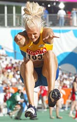 Carolina Kluft performing her winning long jump