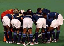 The Indian team in a huddle