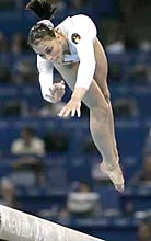 Romania's Catalina Ponor performs on the balance beam during the artistic gymnastics women's team final.