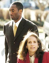LA Lakers basketball superstar Kobe Bryant and attorney Pamela Mackey arrive at the Eagle County Justice Center in Eagle, Colorado