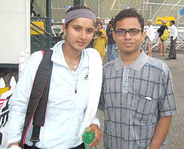 Sania Mirza with a fan.