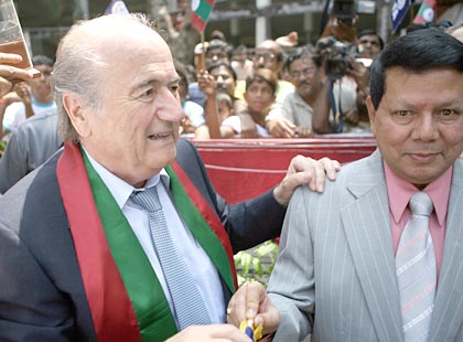  FIFA President Joseph Sepp Blatter (left) walks with Indian Football Association President Priyaranjan Dasmunshi