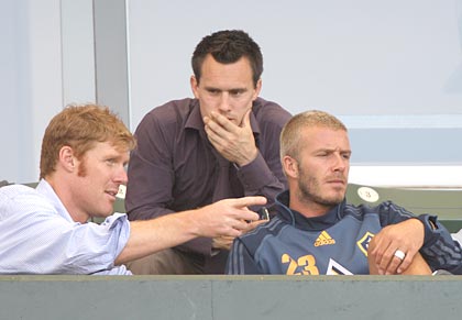 David Beckham watches the match between Los Angeles Galaxy and Tigres UANL