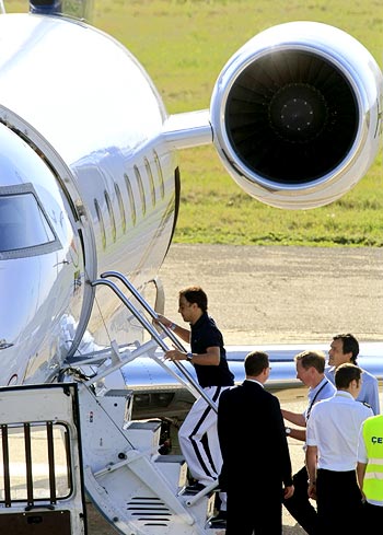 Massa prepares to depart on a private jet to Brazil at Budapest airport after being released from hospital