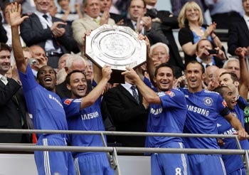 Chelsea's Didier Drogba, John Terry. Frank Lampard and Ricardo Carvalho celebrate with the trophy