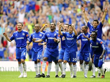 Chelsea players celebrate their triumph